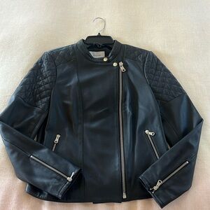 Beautiful leather motorcycle jacket size 8. Pristine condition.